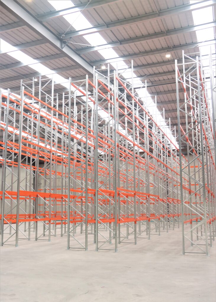 Brand new pallet racking rows mid-installation